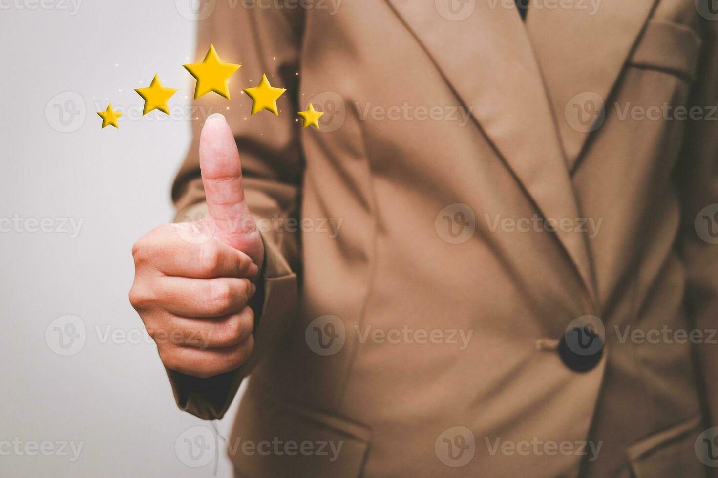 Customer pressing satisfaction with gold five star rating feedback icon and press level excellent rank for giving best score point to review the service , experience success business rate  concept. photo