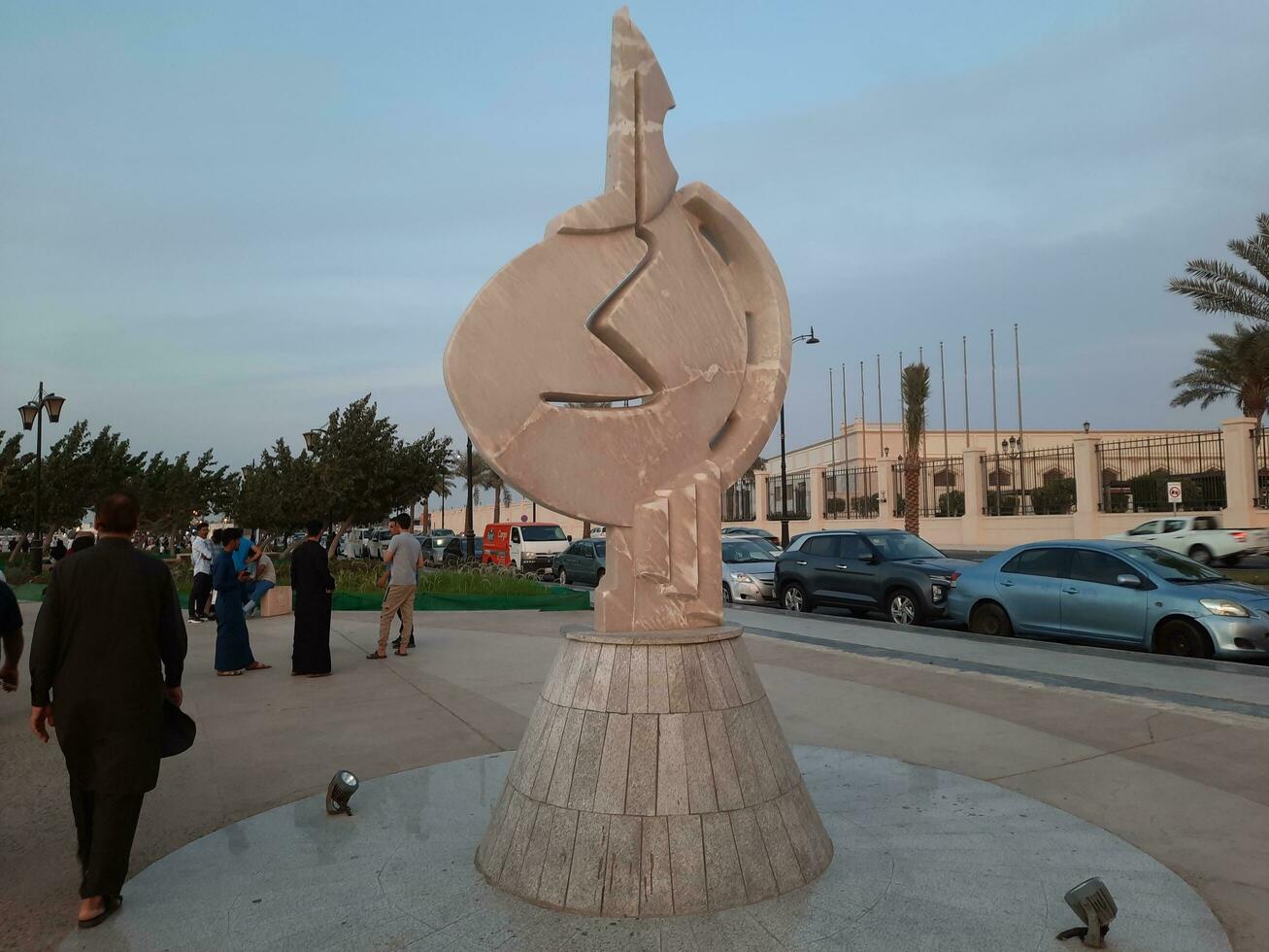 Jeddah, Saudi Arabia, April 2023 - Beautiful evening view of Jeddah Corniche. A large number of people are seen in the park of Jeddah Corniche. photo