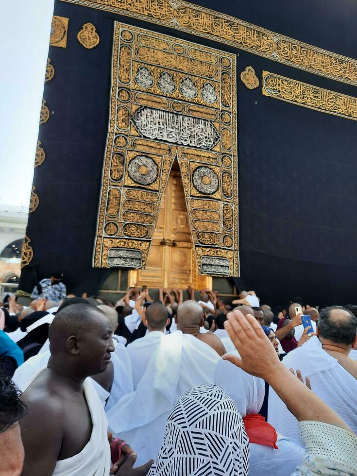 Mecca, Saudi Arabia, April 2023 - Pilgrims from all over the world are present in the courtyard of Masjid al-Haram for Tawaf. photo