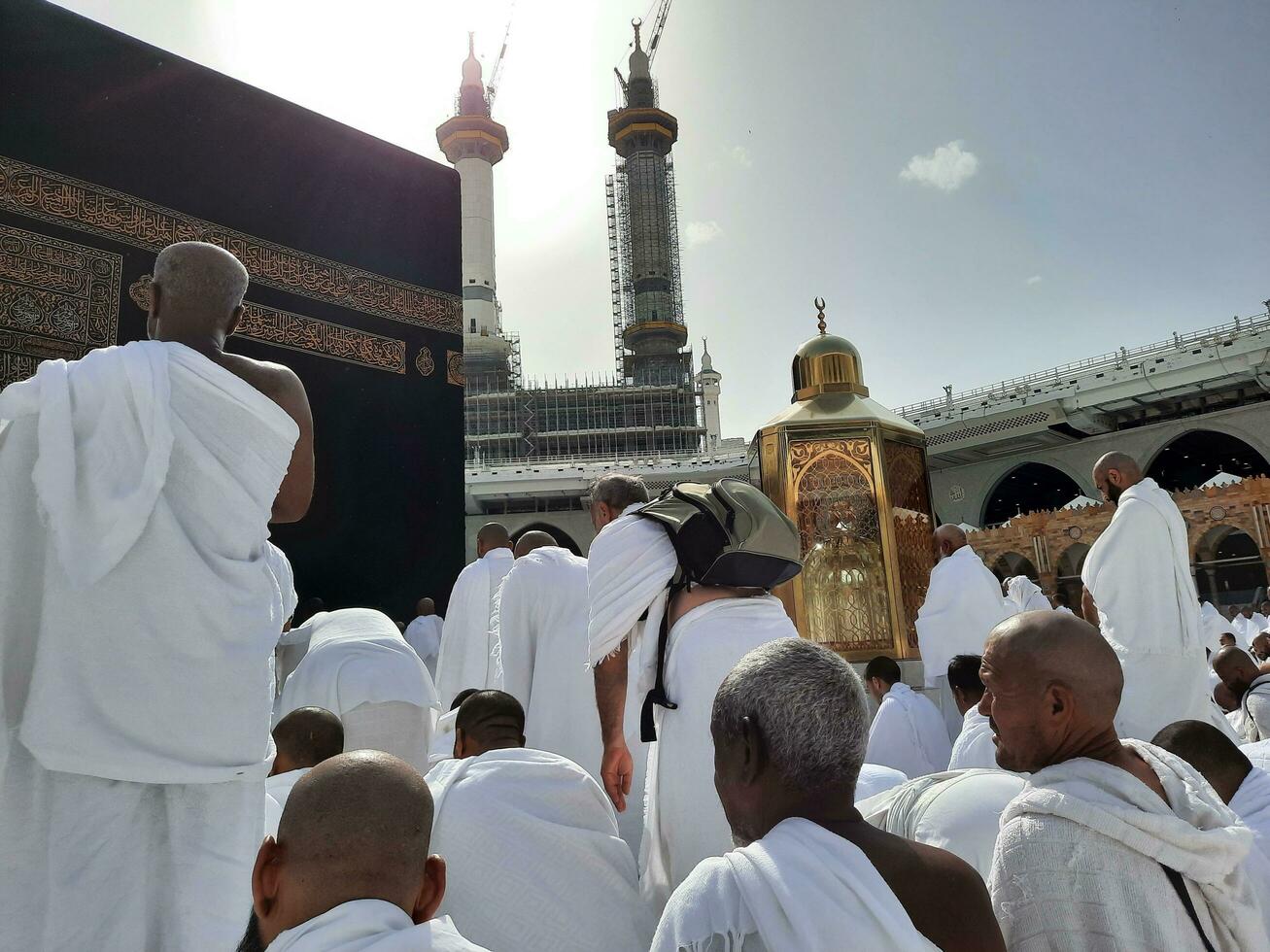 Mecca, Saudi Arabia, April 2023 - Pilgrims from all over the world are present in the courtyard of Masjid al-Haram for Tawaf. photo