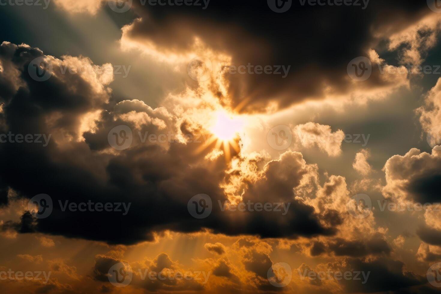 the bright sun comes out from behind the clouds, dramatic sky photo