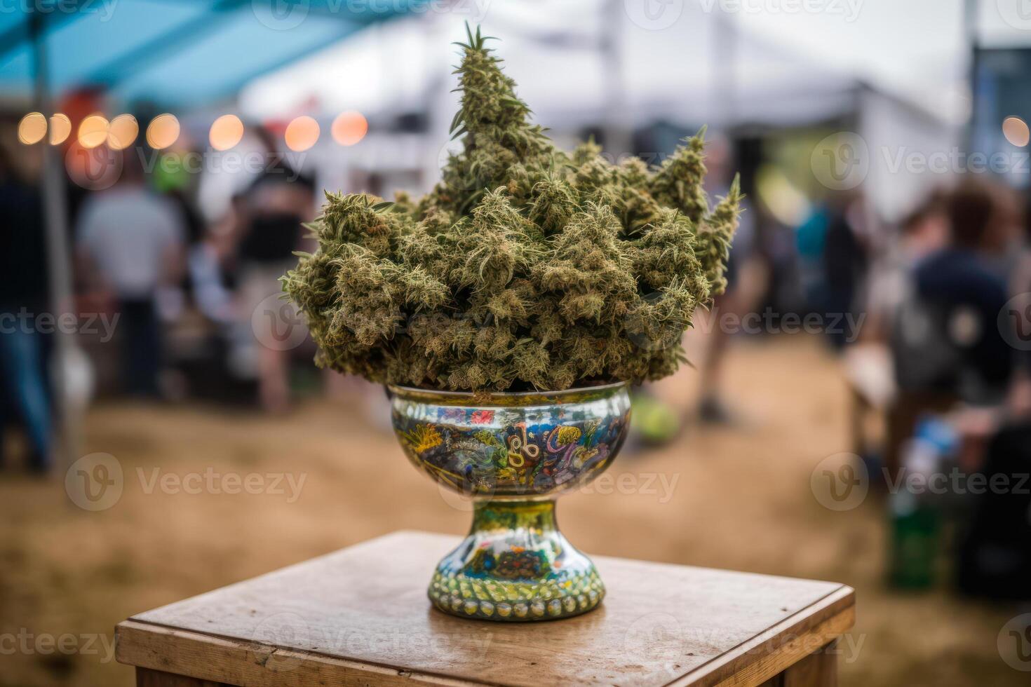 cannabis cup filled with green buds, marijuana festival event photo