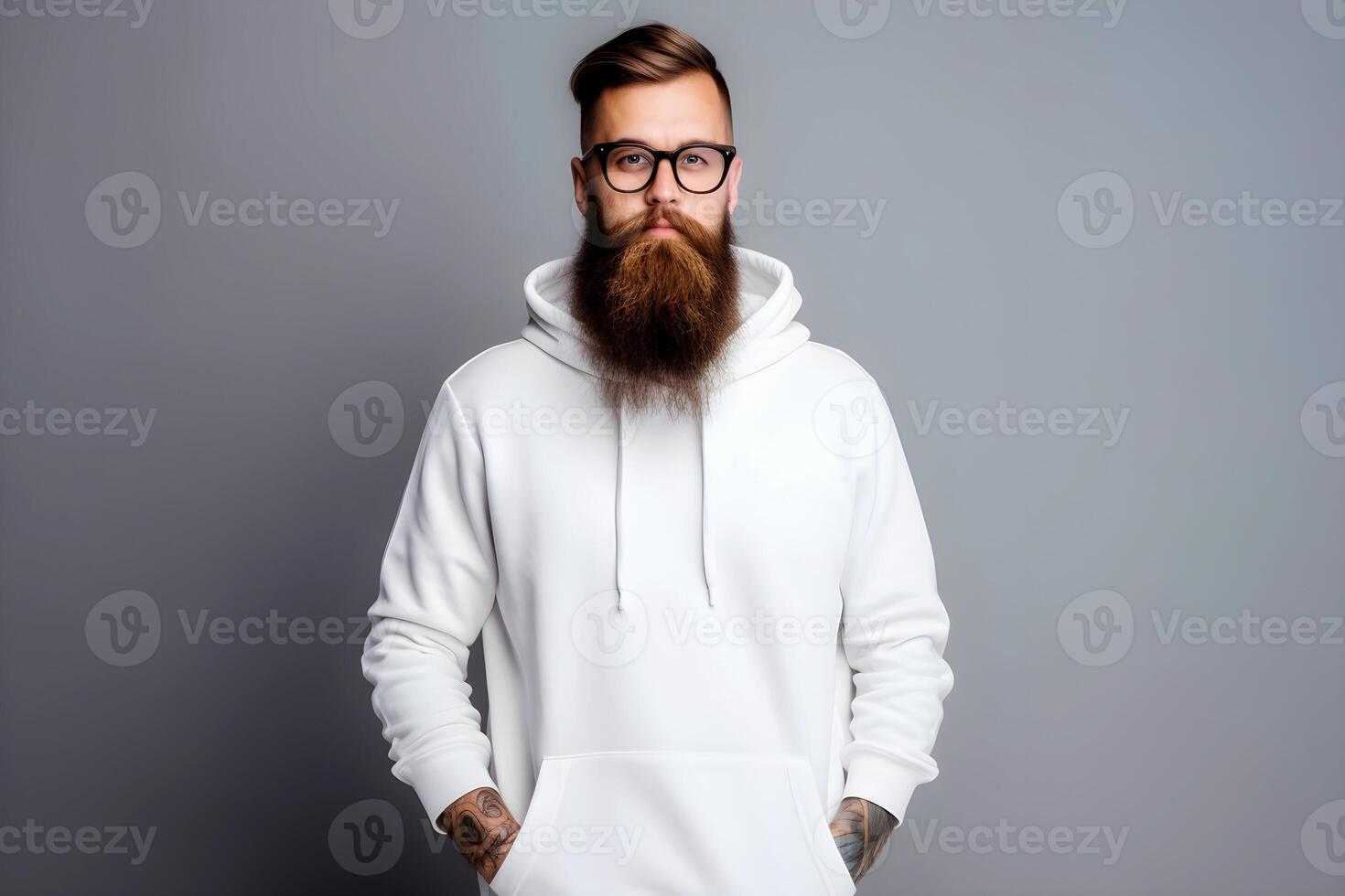 content, Urban portrait of a handsome hipster with a beard in a white blank hoodie with space for your logo or design. photo
