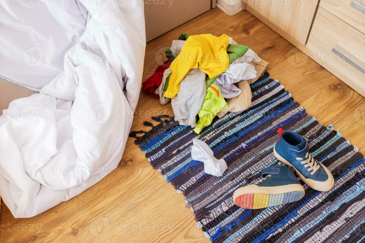 top view, close-up, a pile of dirty things on the floor in the sun, in the morning photo