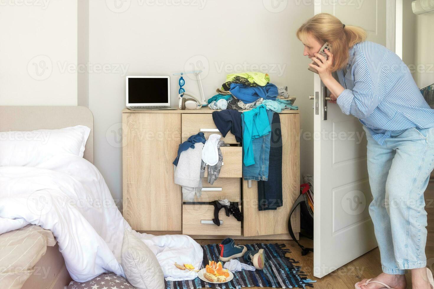 a woman went into a teenager's messy room to clean and was surprised at the mess photo