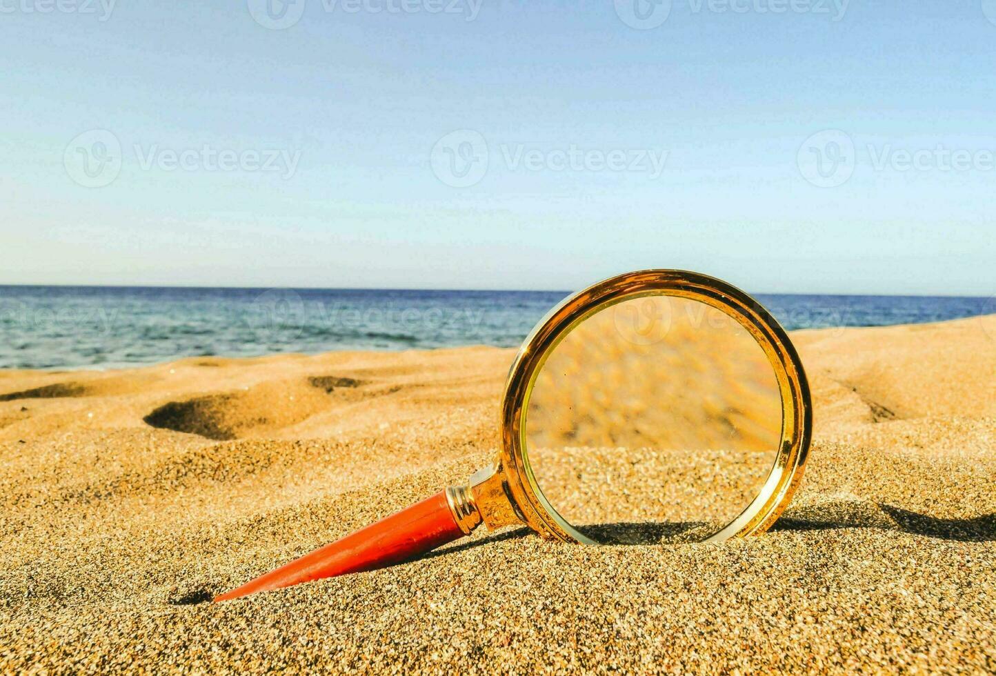 A loupe on the sand photo