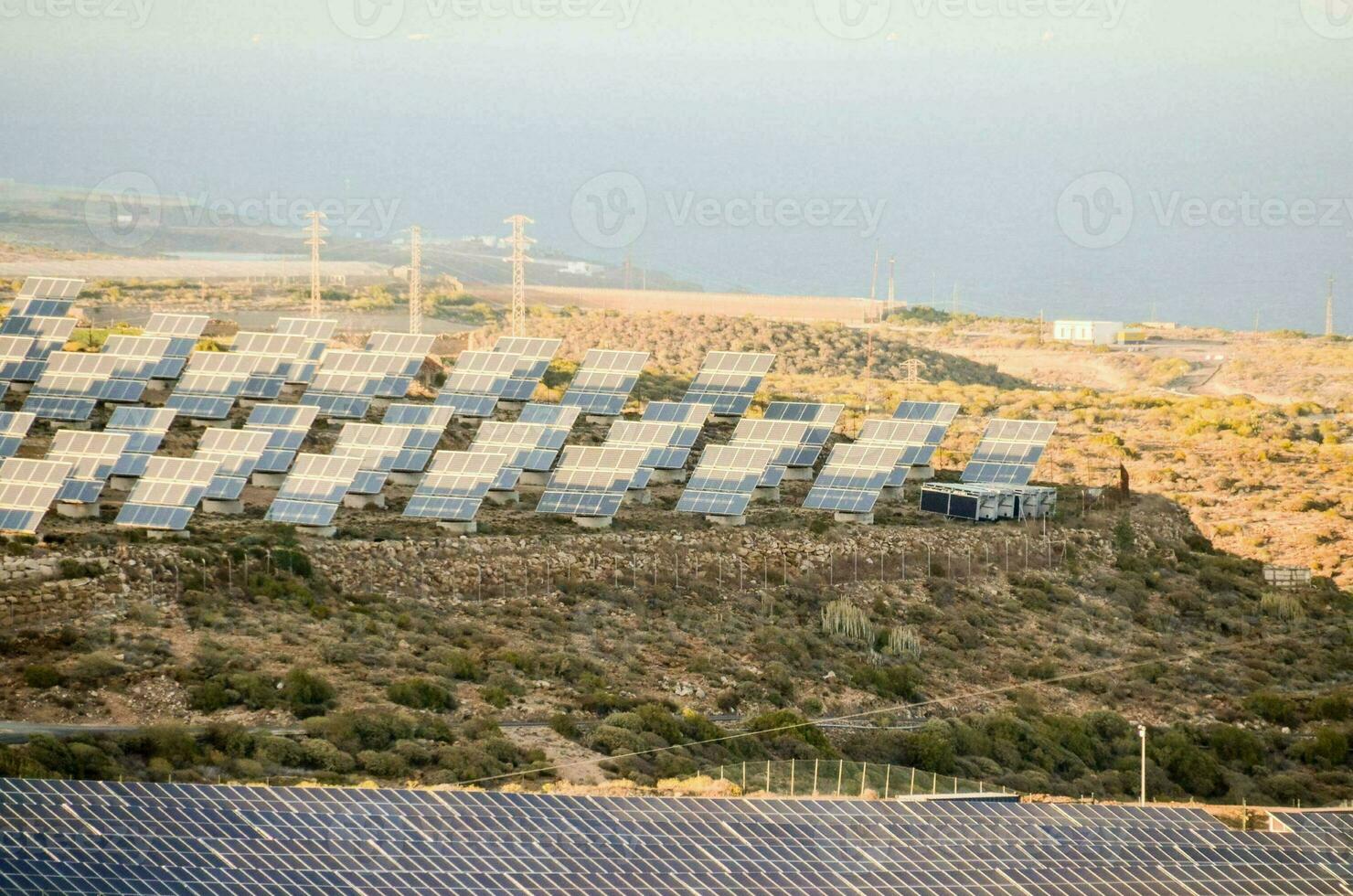 Field with solar panels photo