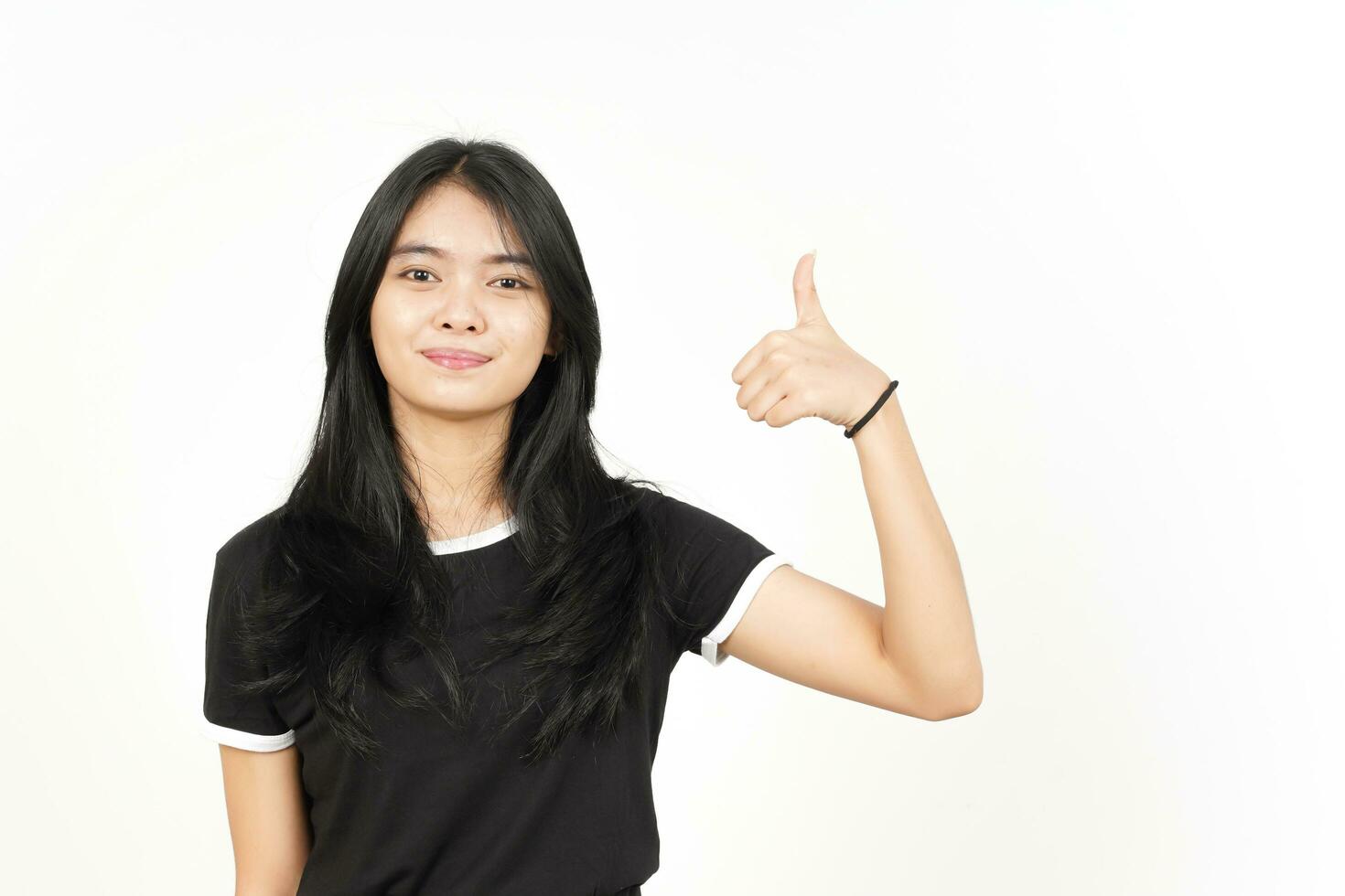 Showing Thumbs up Sign, Approved Sign Of Beautiful Asian Woman Isolated On White Background photo