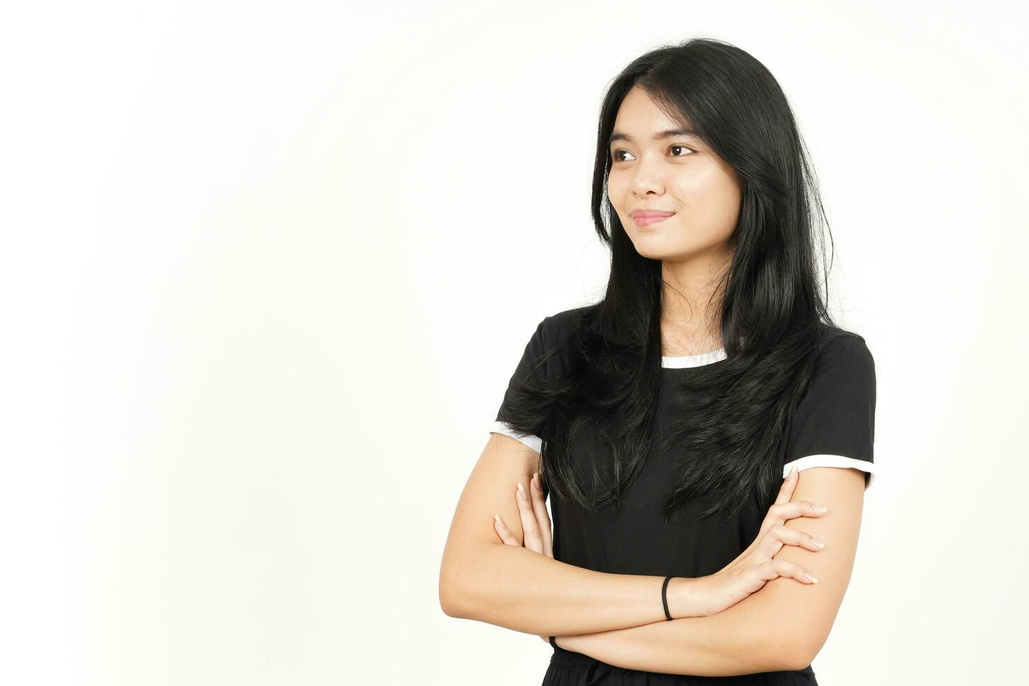 Smile and folding arms side view Of Beautiful Asian Woman Isolated On White Background photo