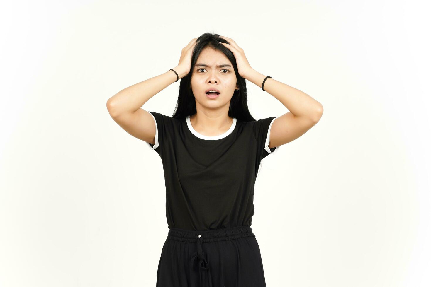 Hands On Head With Shocked Face Expression Of Beautiful Asian Woman Isolated On White Background photo