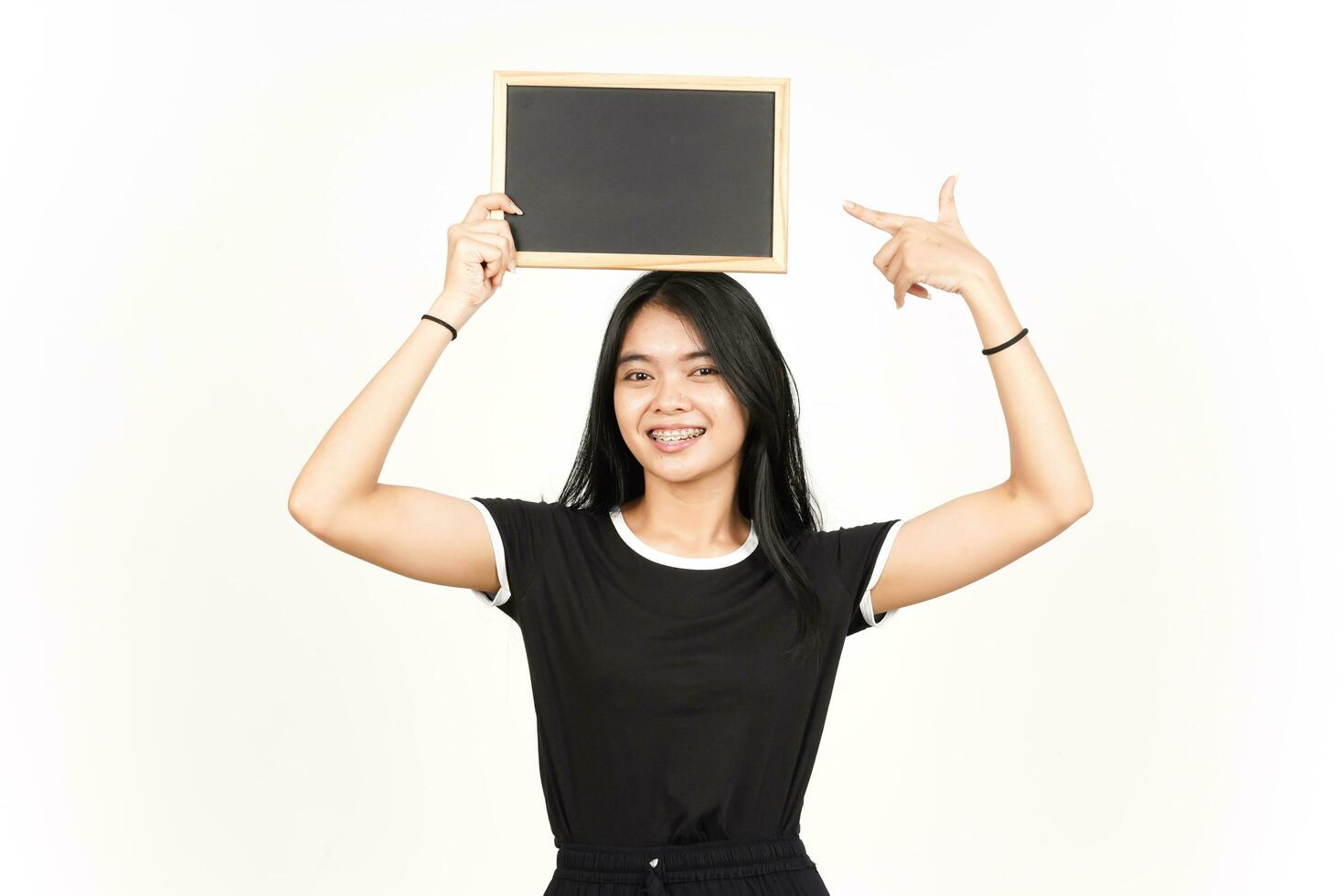 Showing, Presenting and holding Blank Blackboard Of Beautiful Asian Woman Isolated On White photo