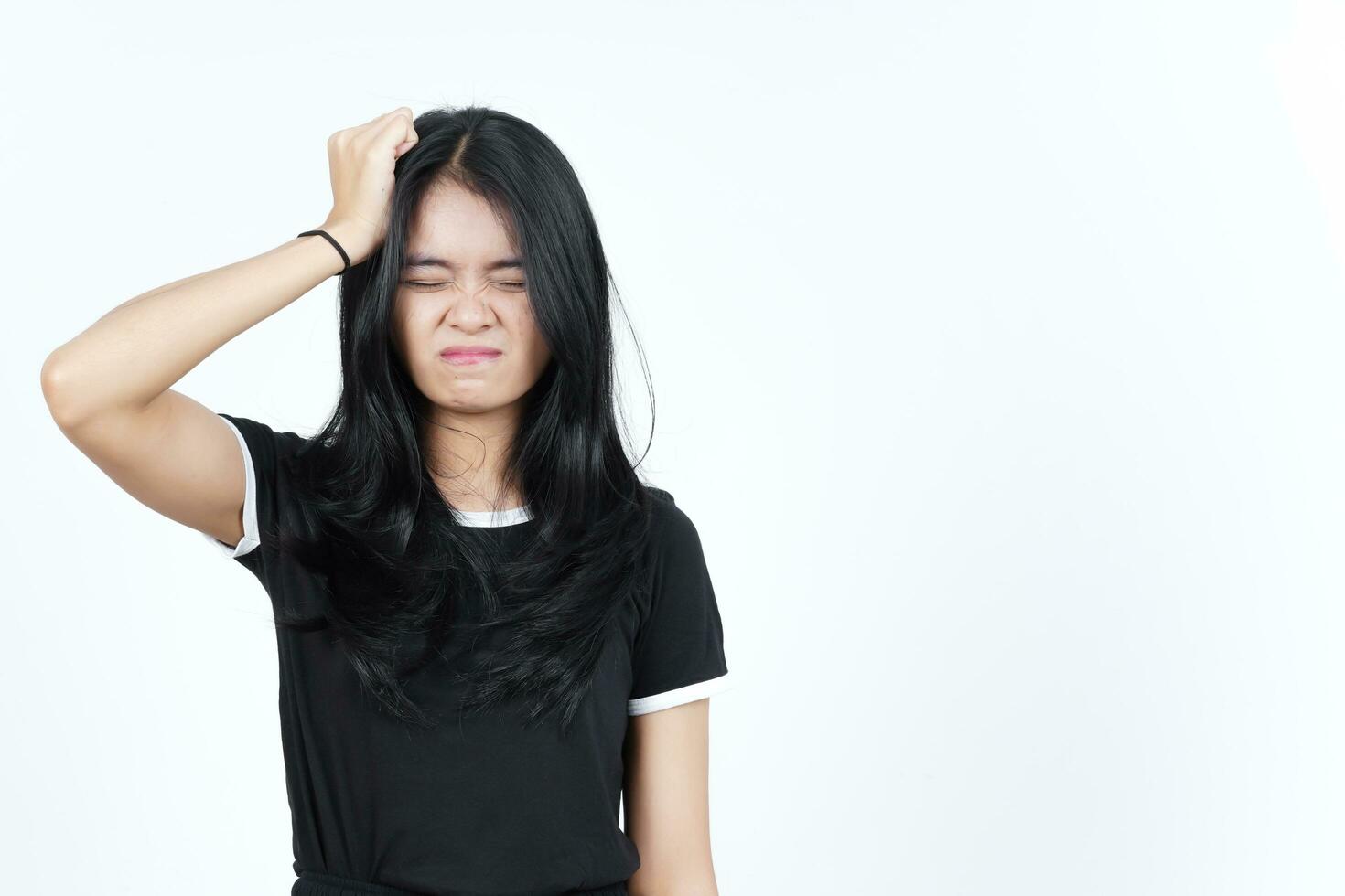 Suffering Headache Gesture Of Beautiful Asian Woman Isolated On White Background photo