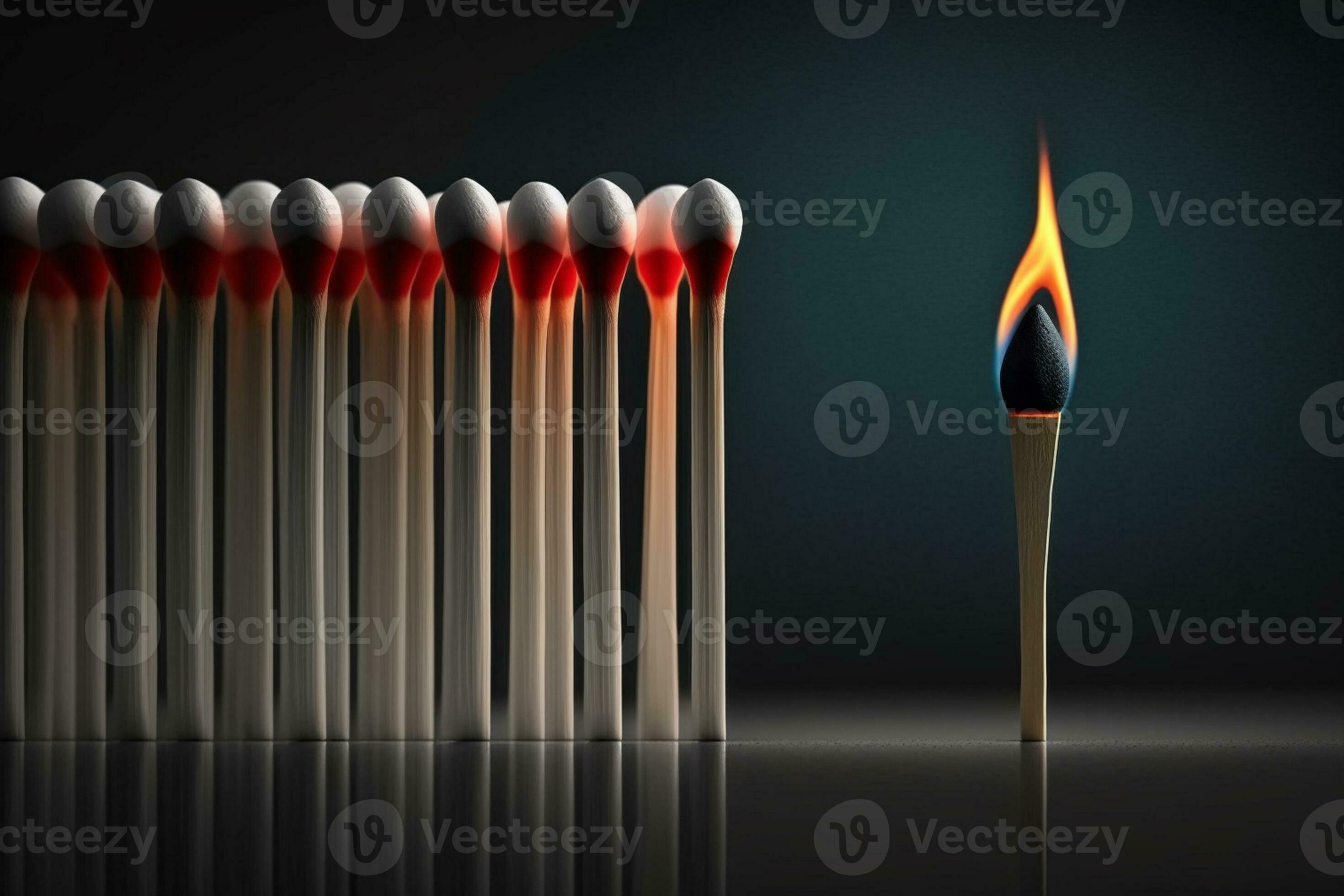 Lit match next to a row of unlit matches. The Passion of One Ignites