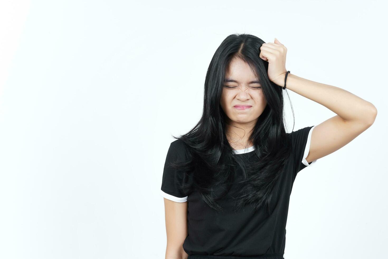 Suffering Headache Gesture Of Beautiful Asian Woman Isolated On White Background photo