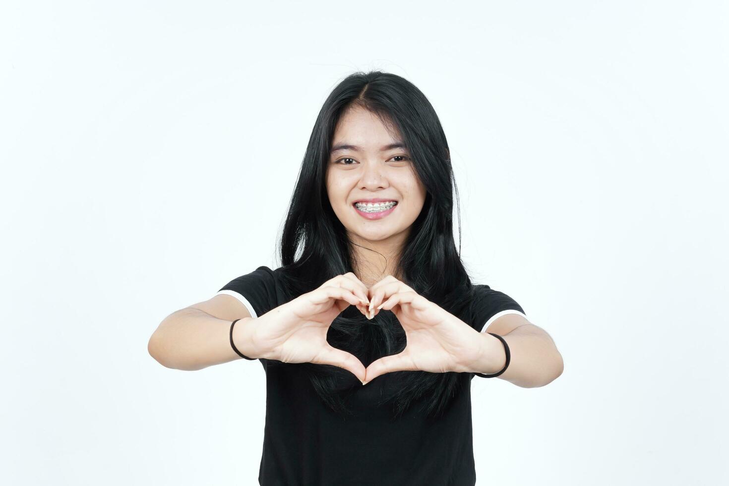 Showing Love Heart Sign Of Beautiful Asian Woman Isolated On White Background photo