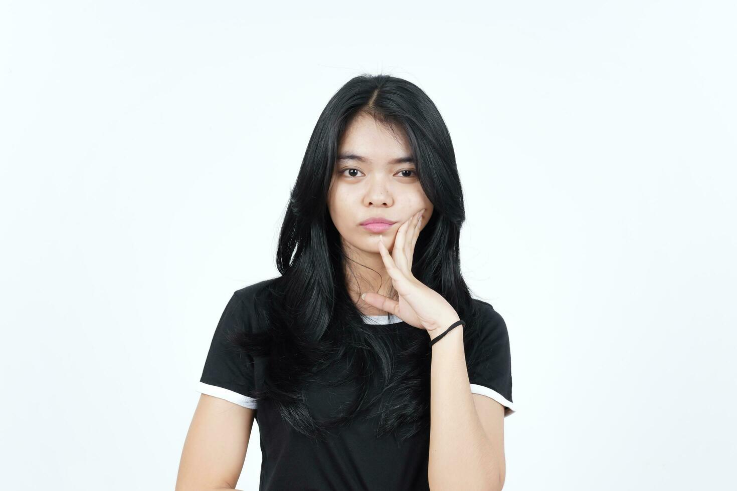 Serious Face hand on cheek and looking at camera Of Beautiful Asian Woman Isolated On White photo