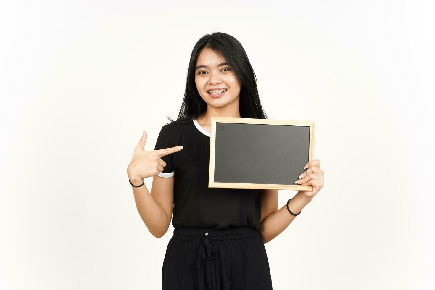 Showing, Presenting and holding Blank Blackboard Of Beautiful Asian Woman Isolated On White Background photo