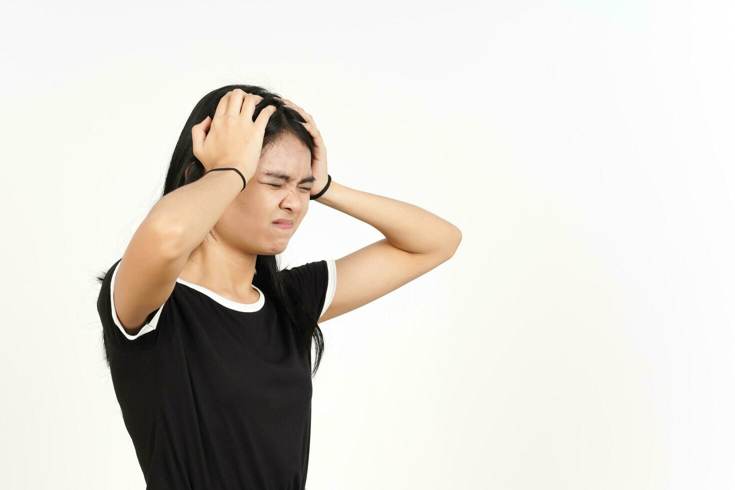 Suffering Headache Gesture Of Beautiful Asian Woman Isolated On White Background photo