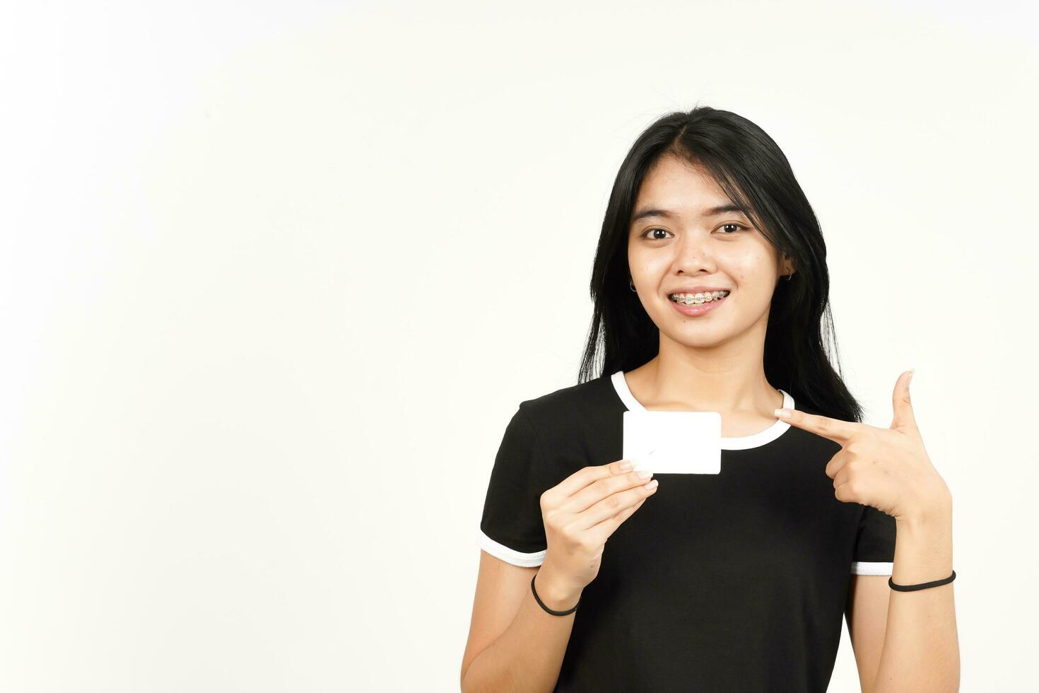 Holding Blank Bank Card Or Credit Card Of Beautiful Asian Woman Isolated On White Background photo