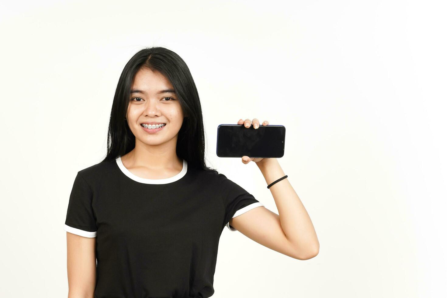 Showing Apps or Ads On Blank Screen Smartphone Of Beautiful Asian Woman Isolated On White Background photo