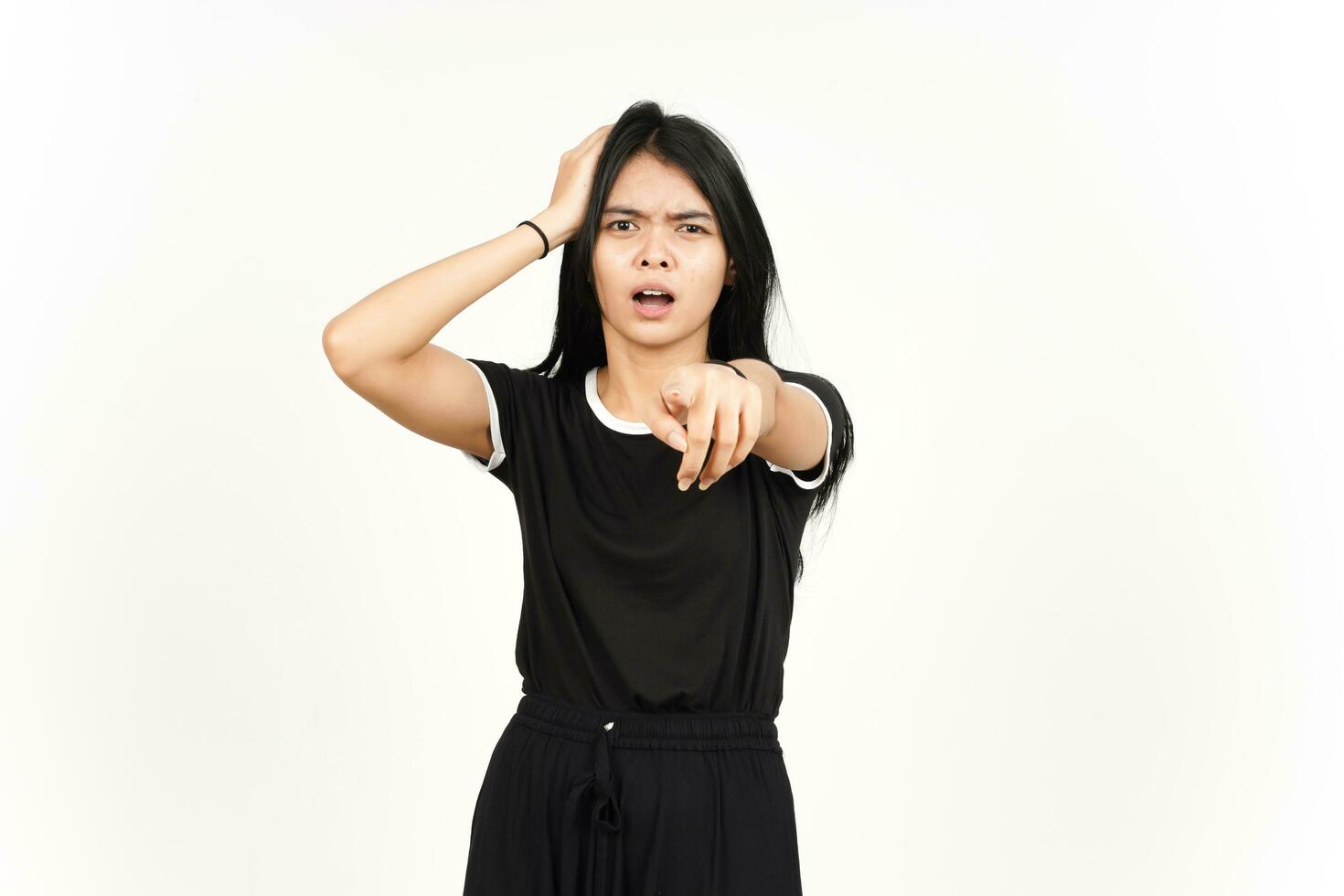Shocked Face And Pointing at camera Of Beautiful Asian Woman Isolated On White Background photo