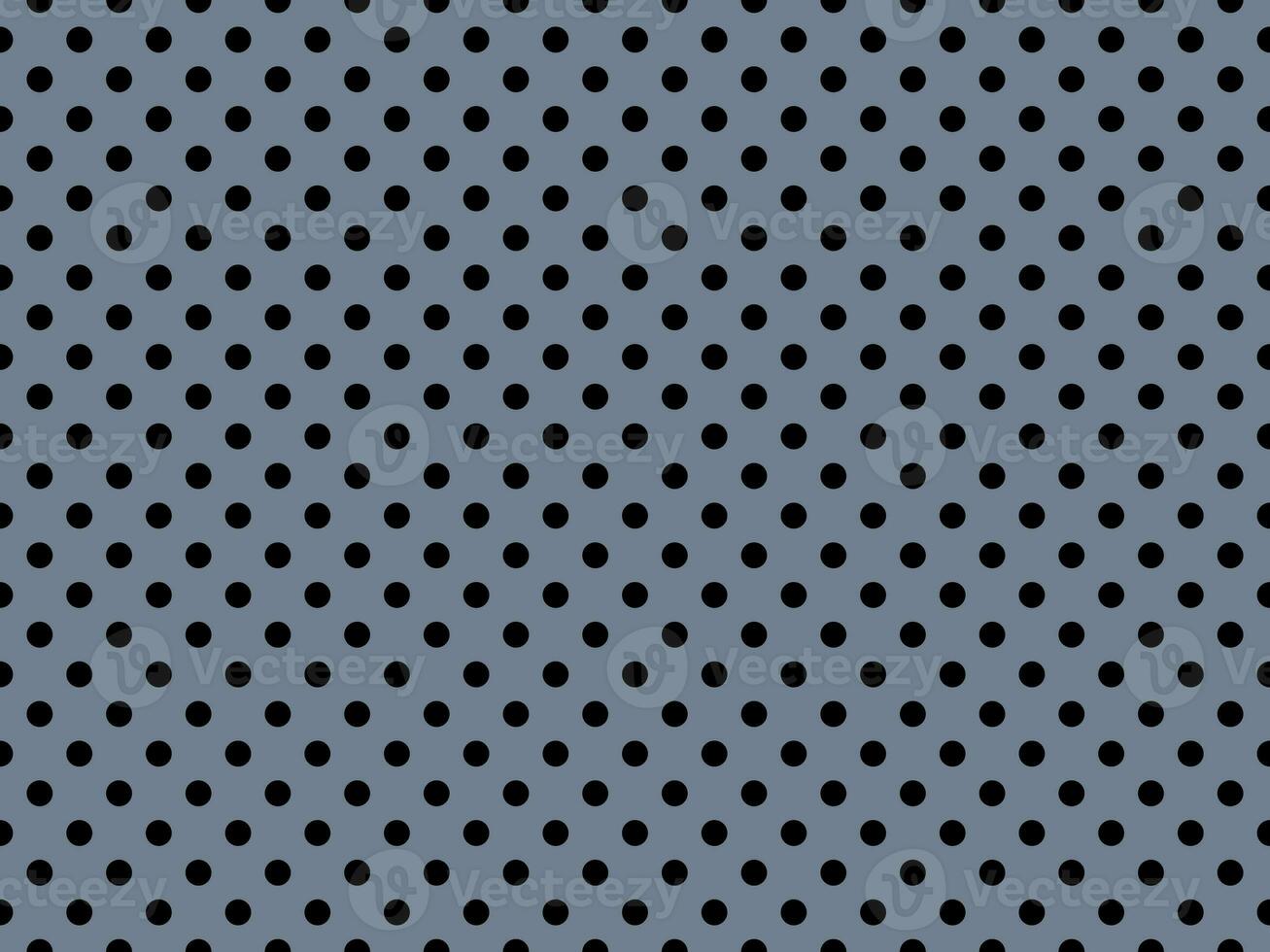 black polka dots over slate gray background photo