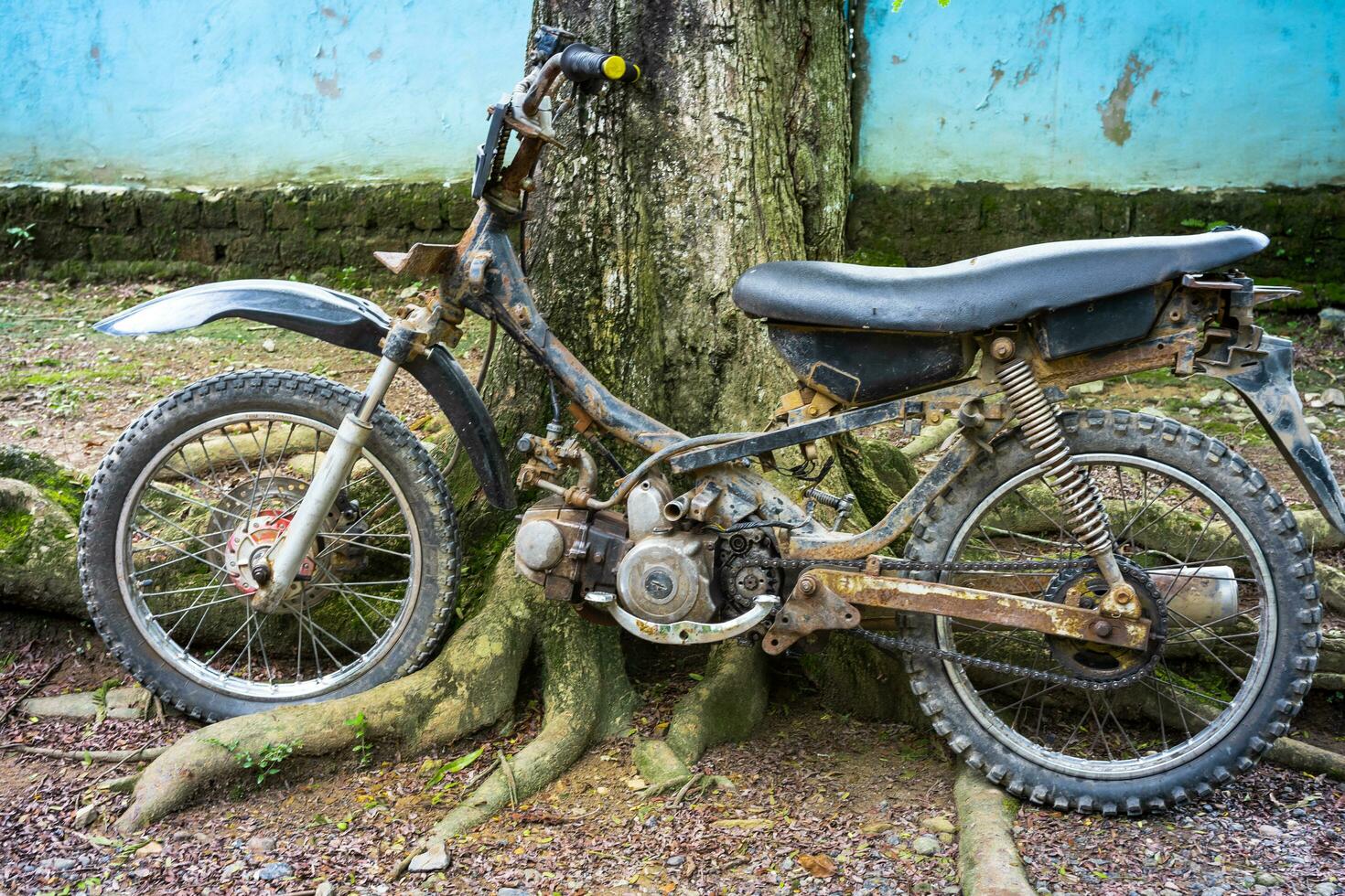 black and rusty old motorbike photo