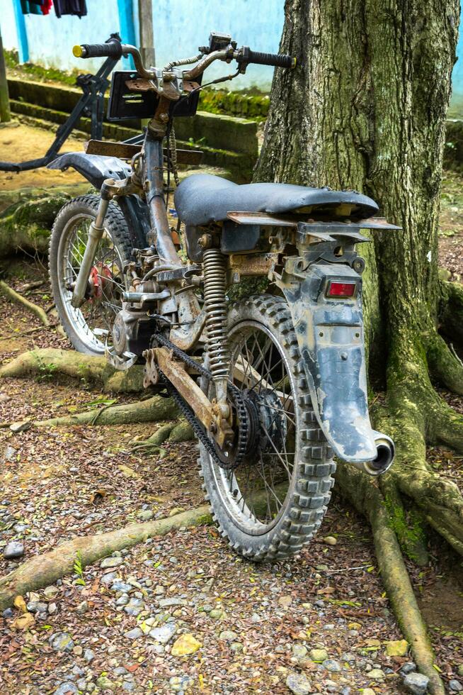 black and rusty old motorbike photo