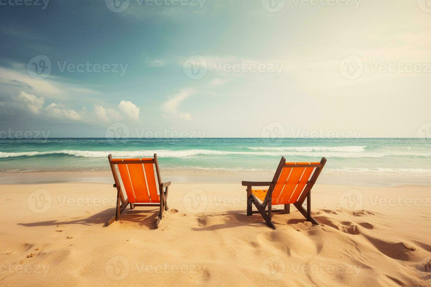 Two wooden chairs on the tropical beach with blue sky background