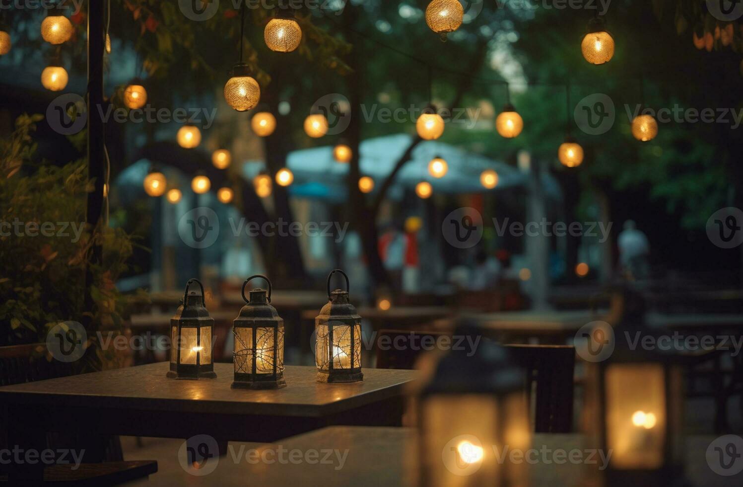 Abstract Blurred image of Night Festival in garden with bokeh for background usage. Concept of vintage tones photo