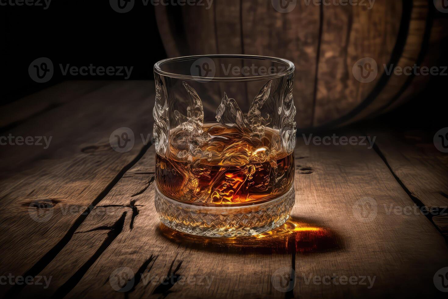 Glass of whiskey on wooden background. photo
