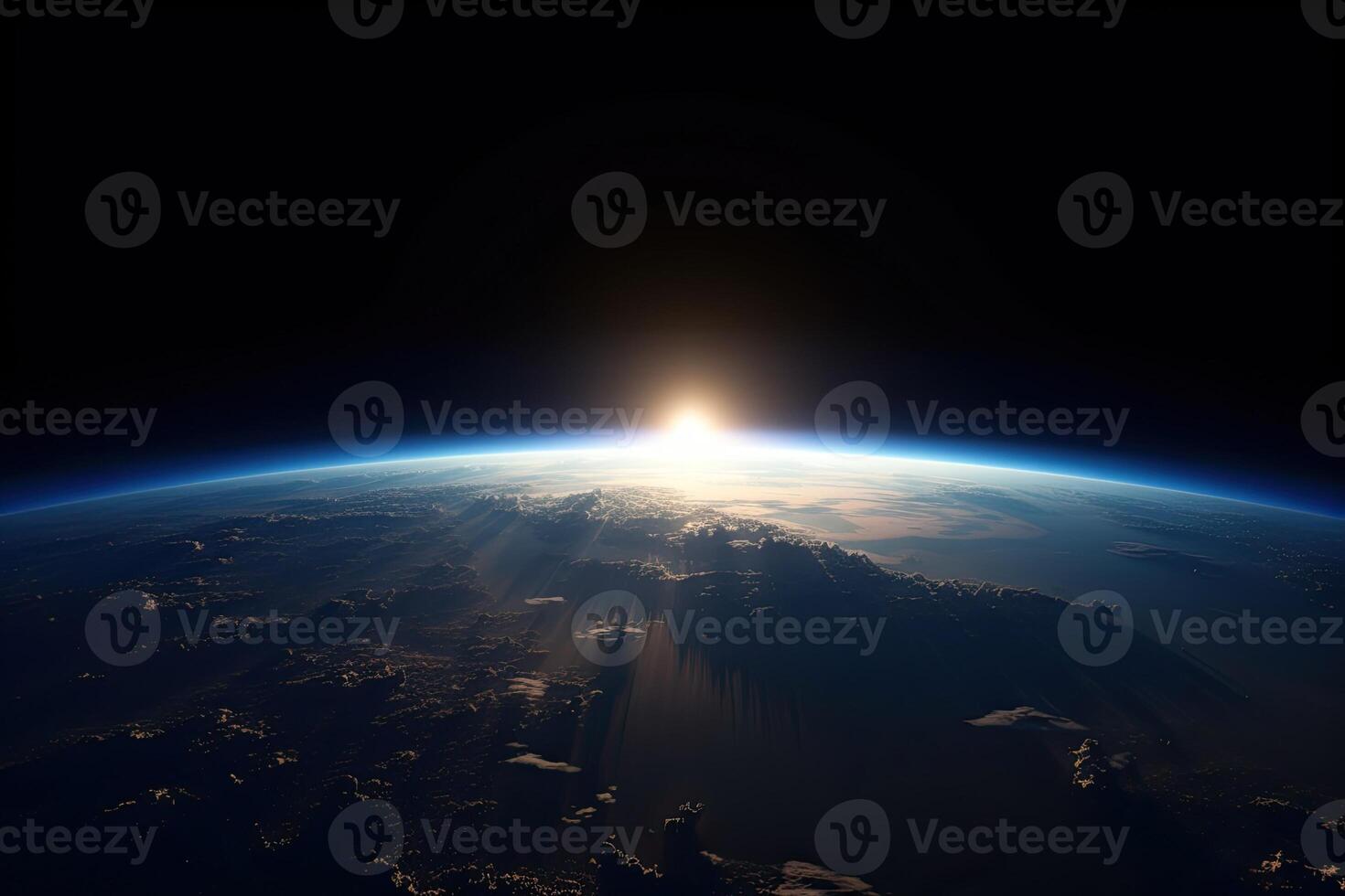 Sunrise view of the planet Earth from space with the sun setting over the horizon. photo