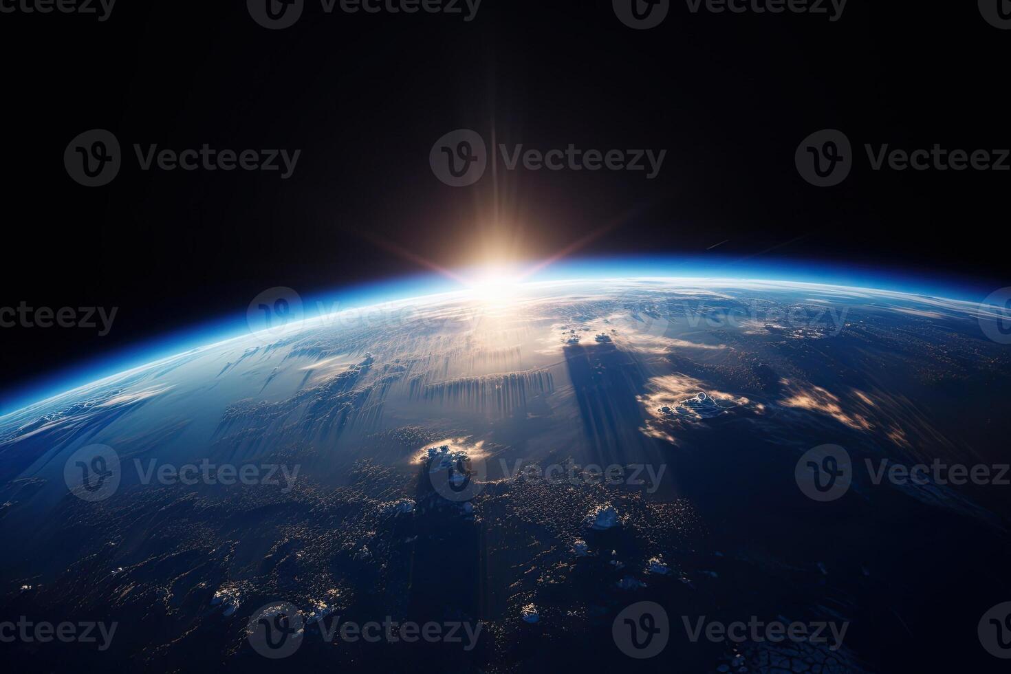 Sunrise view of the planet Earth from space with the sun setting over the horizon. photo