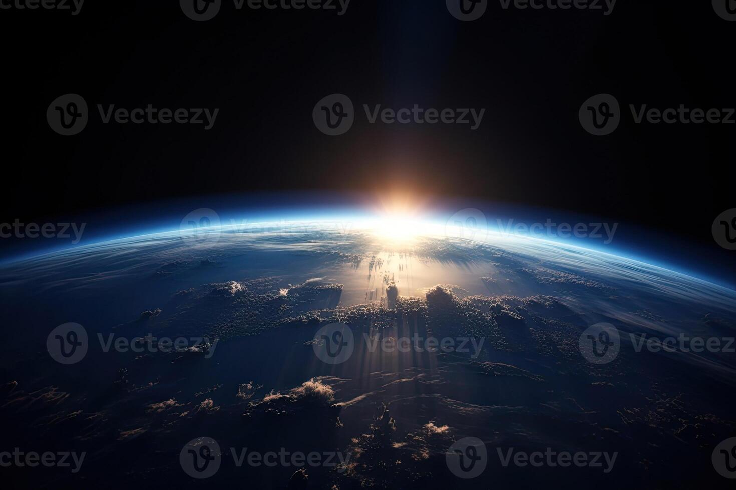 Sunrise view of the planet Earth from space with the sun setting over the horizon. photo