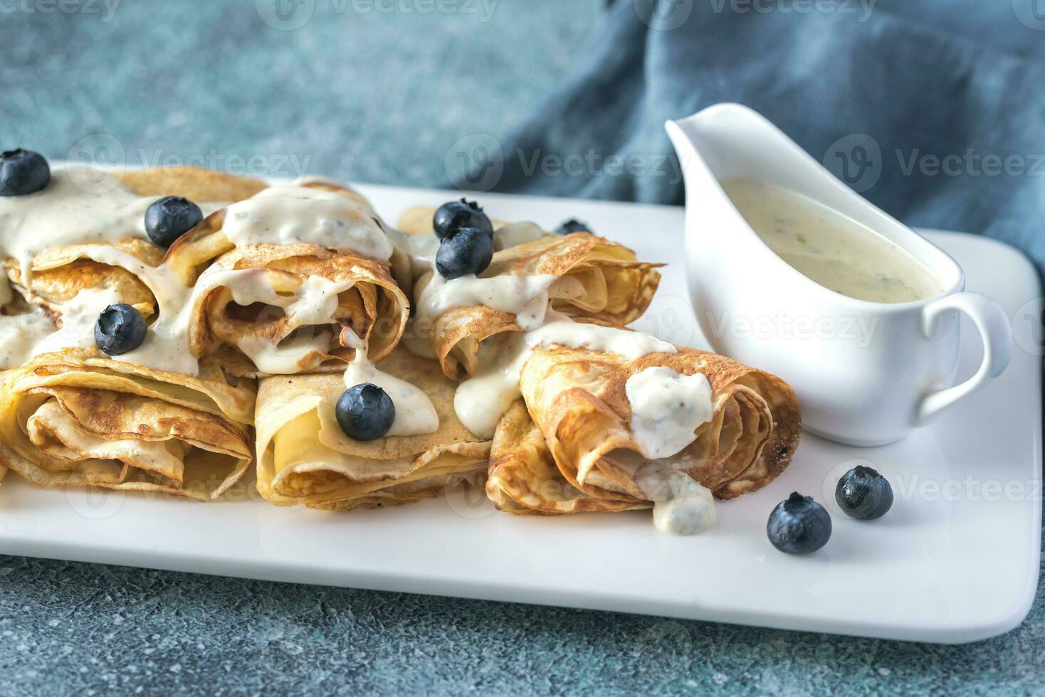 Crepes with blue cheese sauce photo