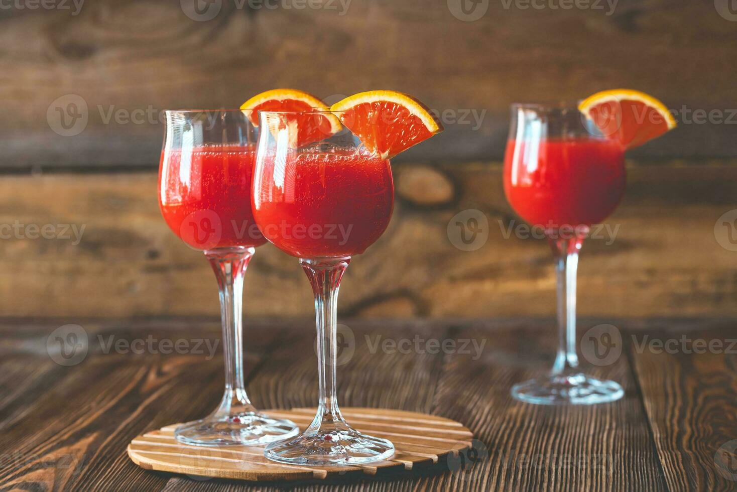 Three glasses of Mimosa cocktail photo