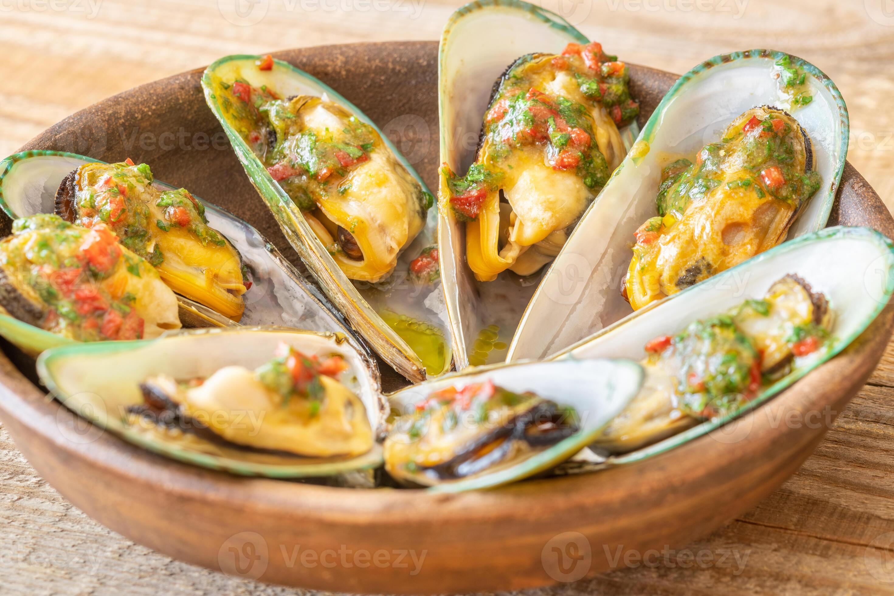 Baked half shell mussels 23490969 Stock Photo at Vecteezy