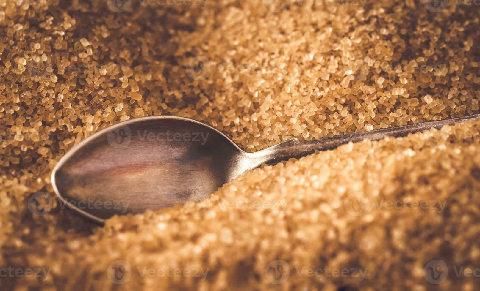 Spoon in brown sugar photo