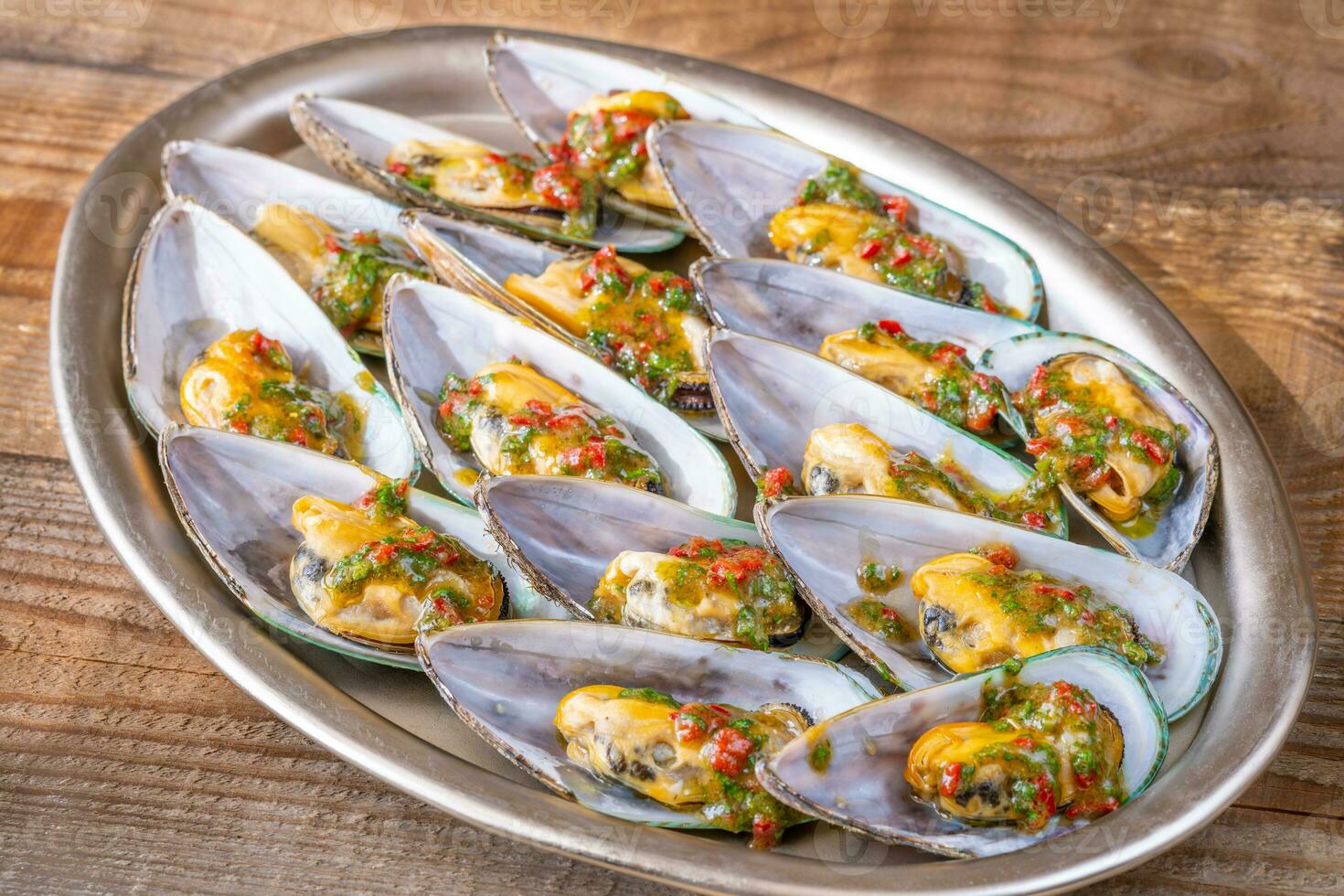 Baked half shell mussels photo