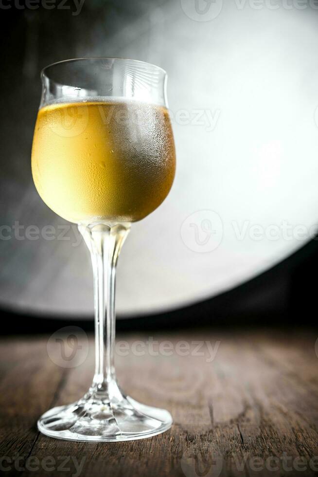 Glass of white wine photo