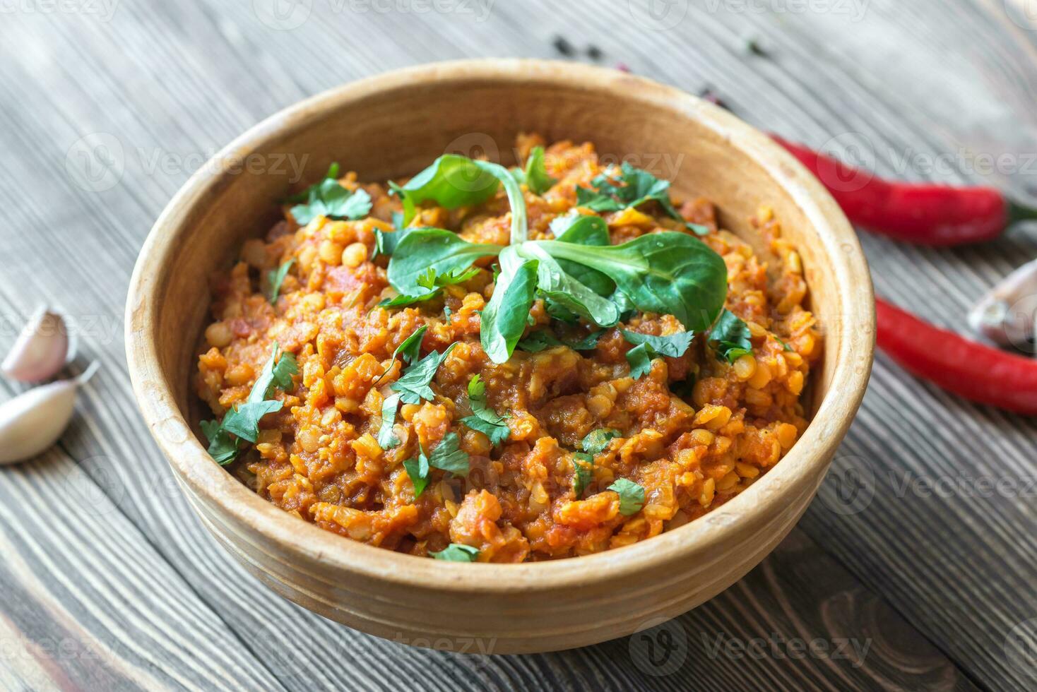 Bowl of red lentil curry photo