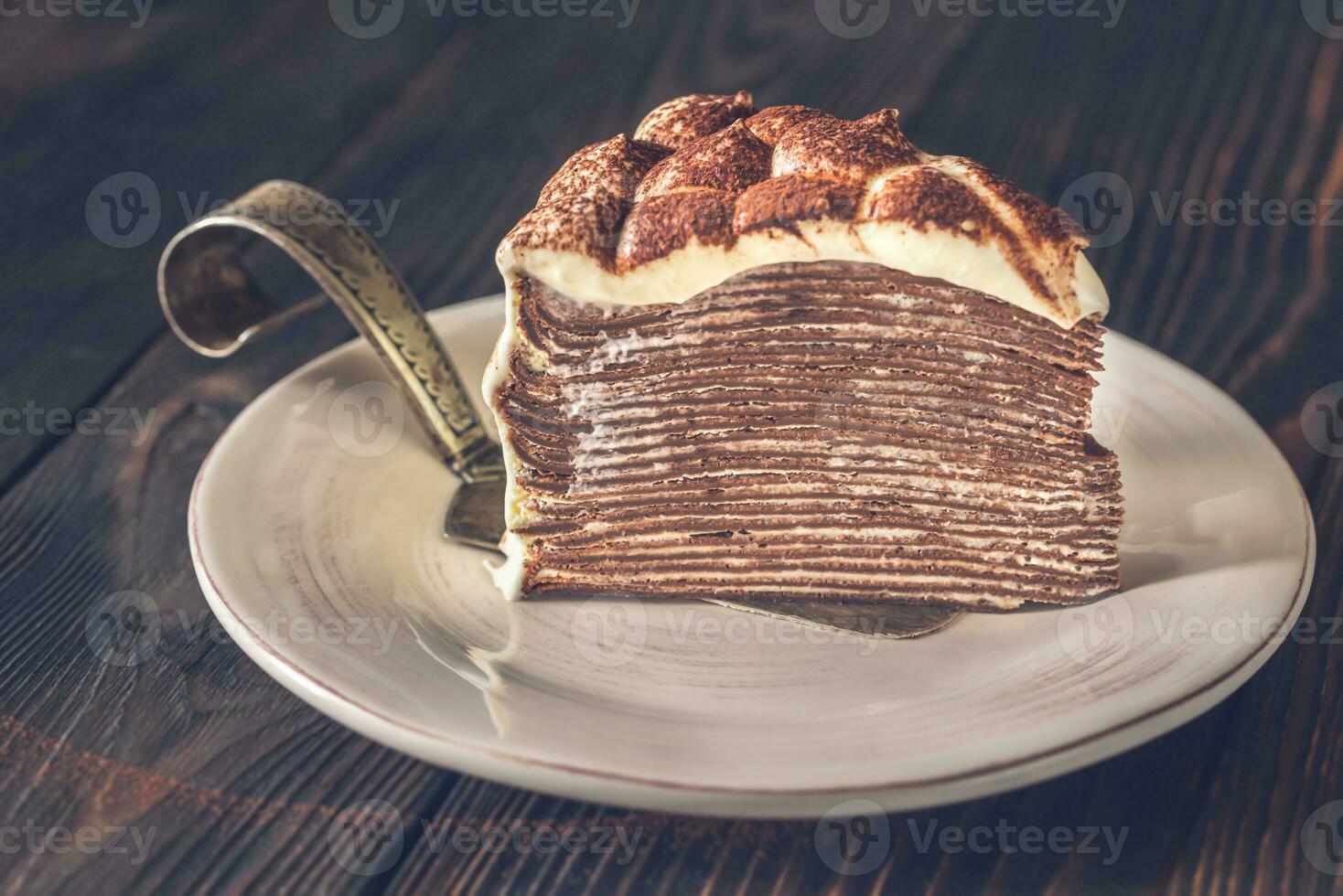 Slice of tiramisu crepe cake photo