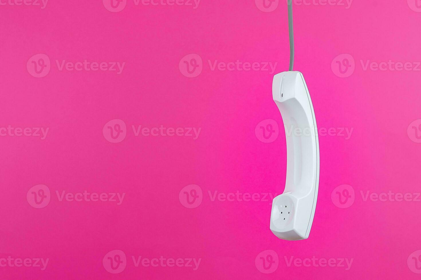 White telephone receiver with copy space photo