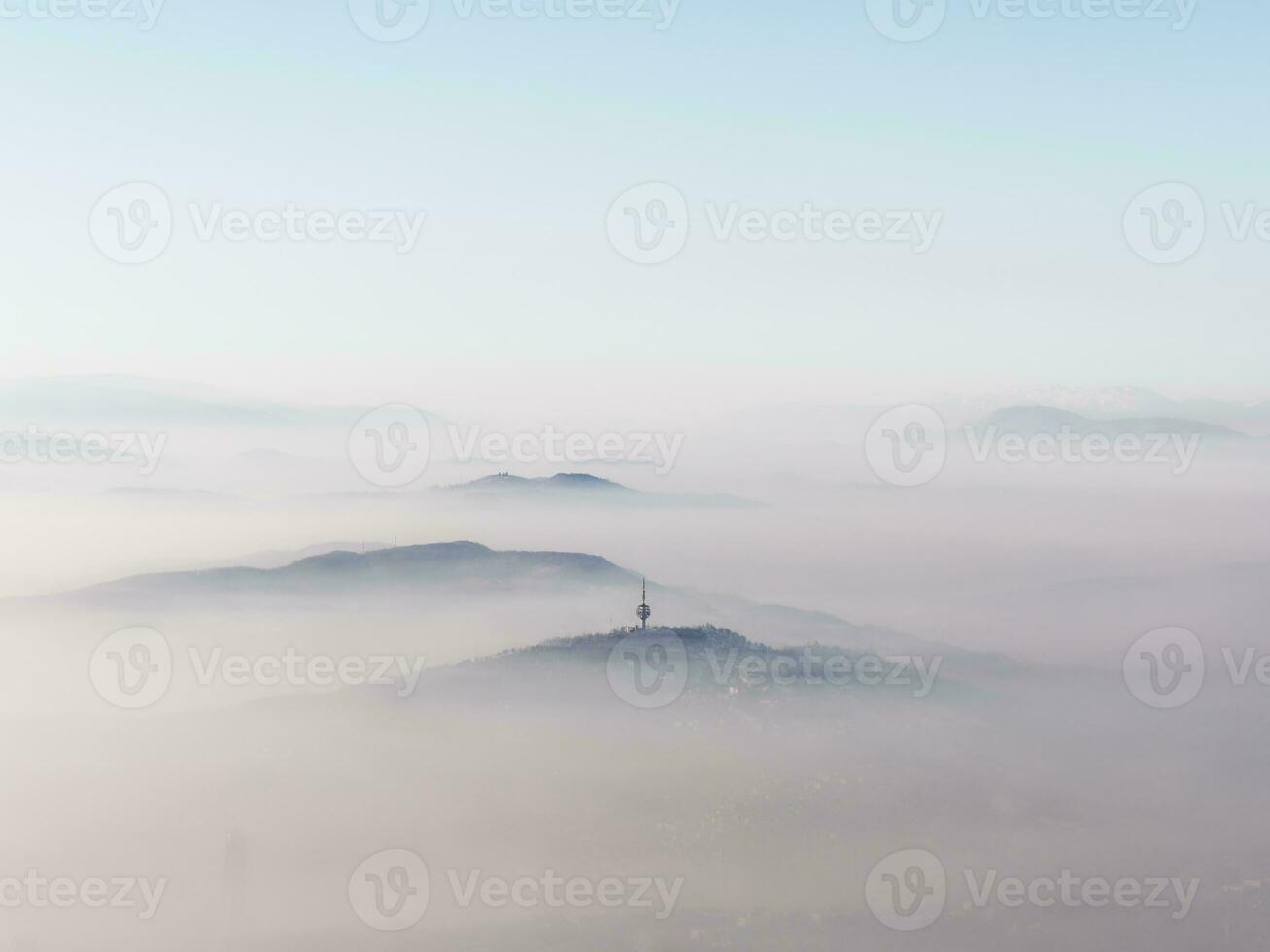 Sarajevo city, capital of Bosnia and Herzegovina engulfed in smog. Air pollution. Dirty air. Public health problem. Stop fossil fuel. photo