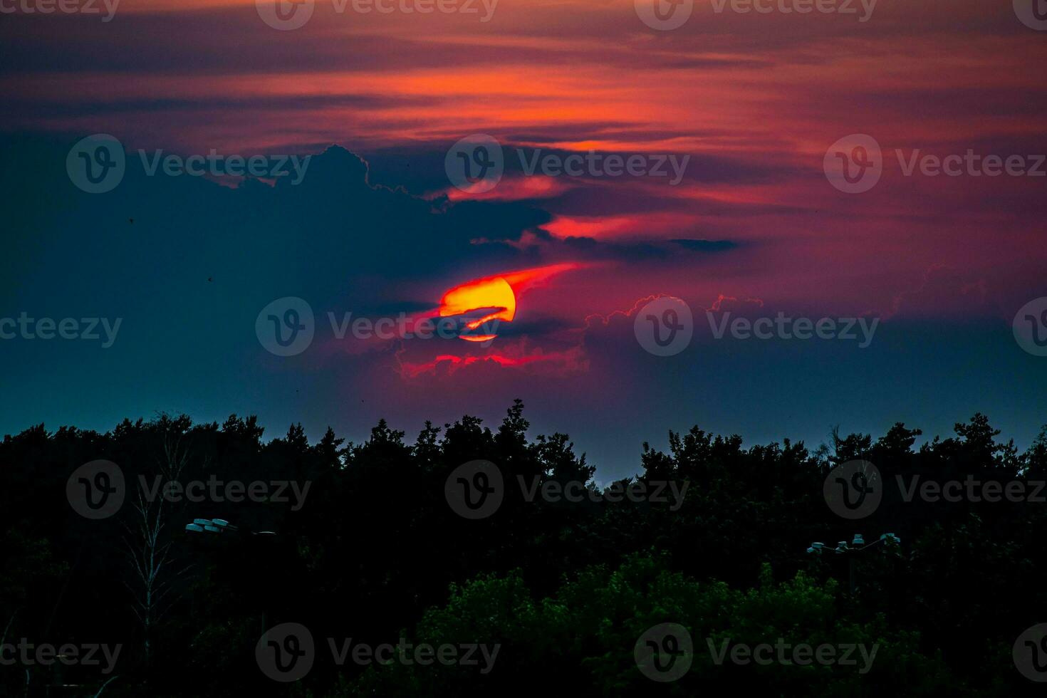 colorful sunset landscape with clouds and dramatic sky photo