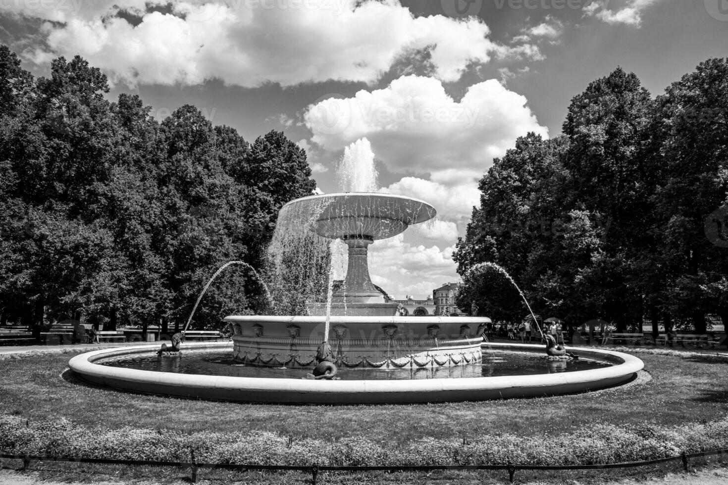 historic famous fountain in the park on a warm summer day in Warsaw photo