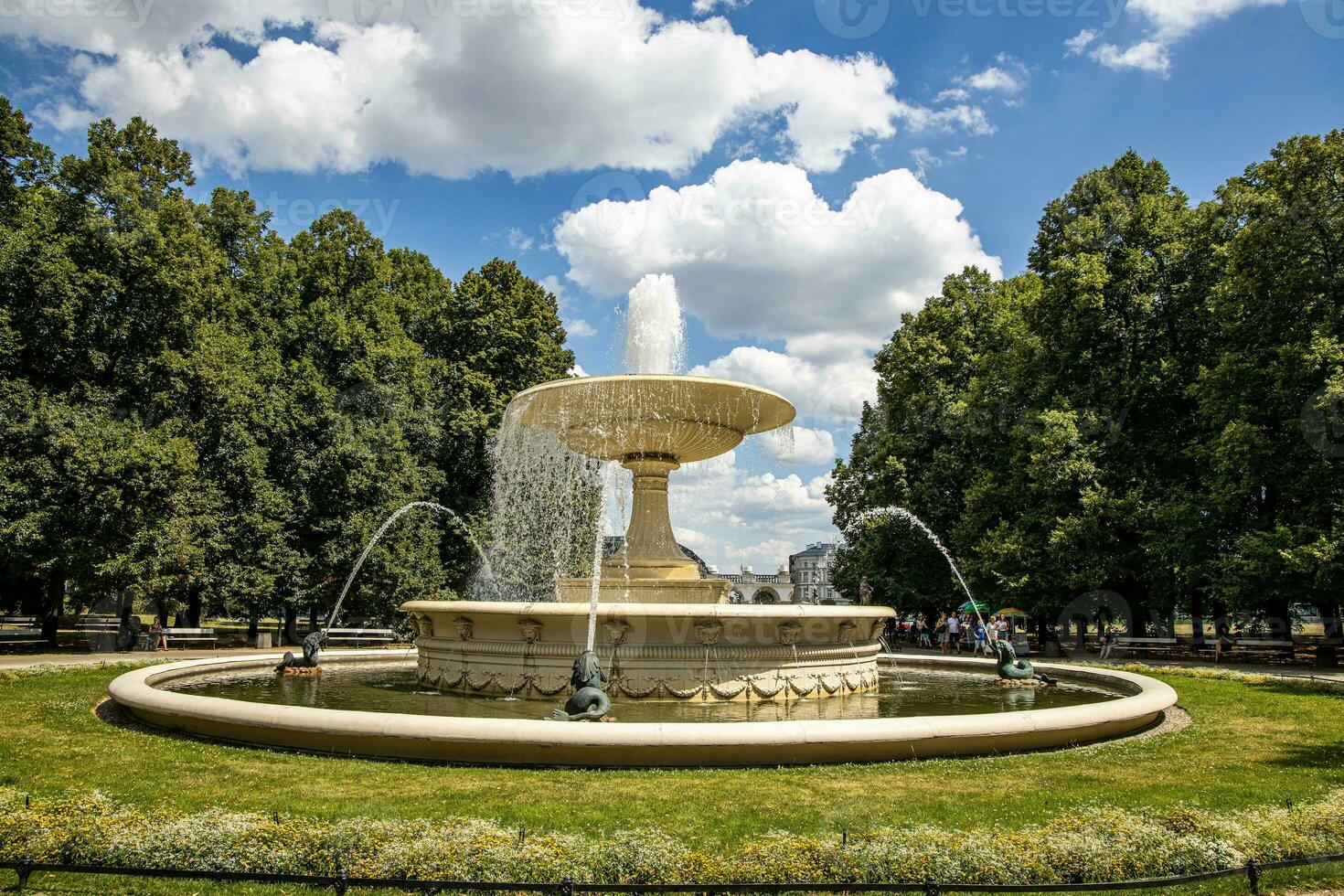 historic famous fountain in the park on a warm summer day in Warsaw photo