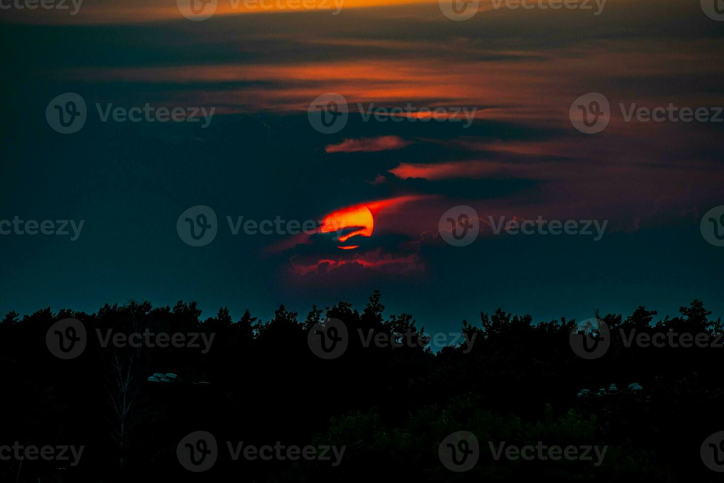 colorful sunset landscape with clouds and dramatic sky photo
