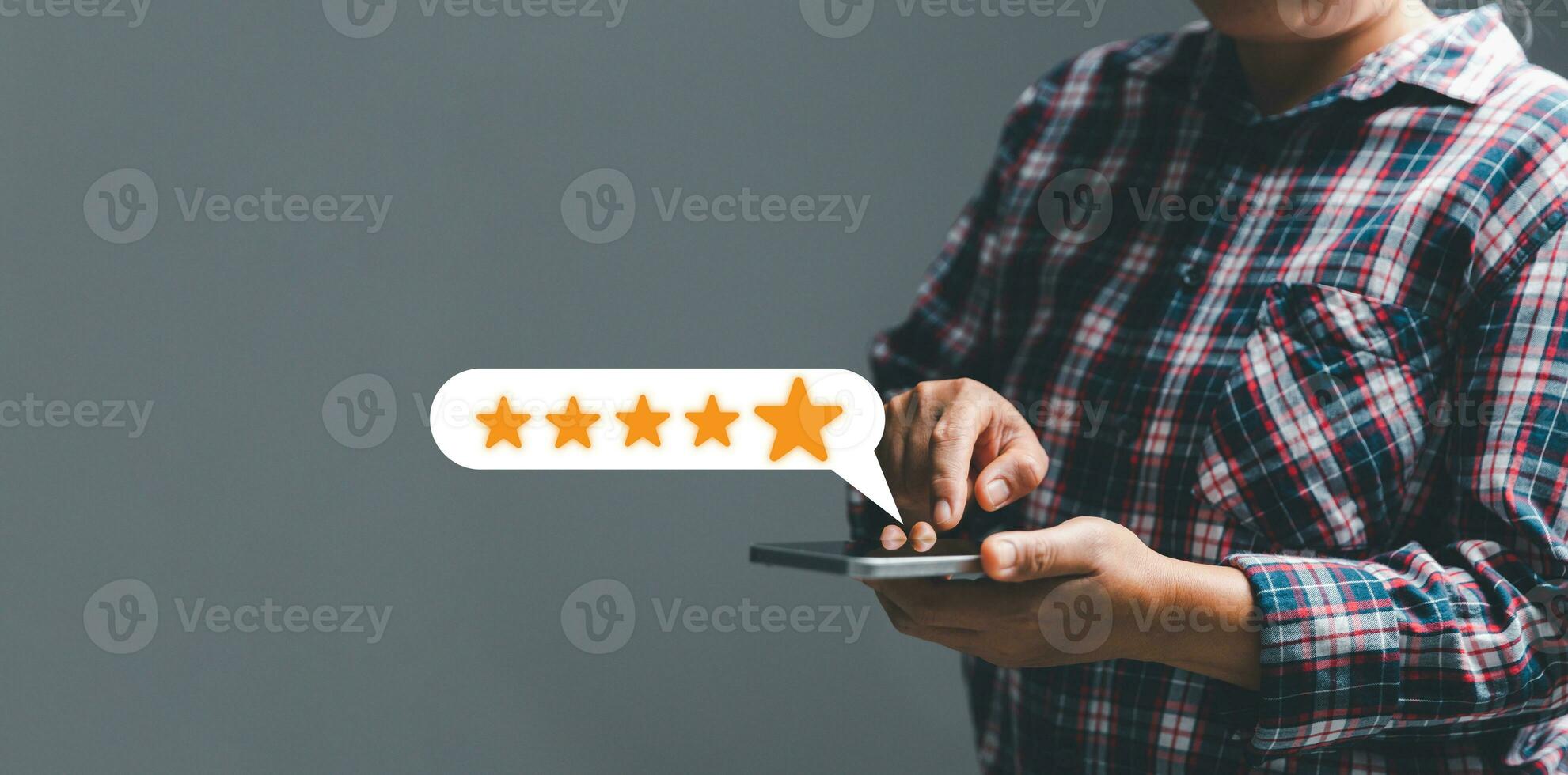 Customer experience with customer service and satisfaction concept. Woman finger touching on five star excellent rating on smartphone, copy space, Customers show satisfaction and quality of services. photo