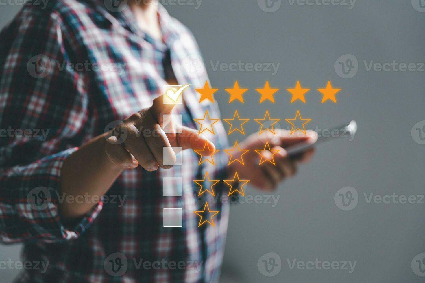 Customer experience with customer service and satisfaction concept. Woman finger touching on five star excellent rating on background, copy space, Customers show satisfaction and quality of services. photo